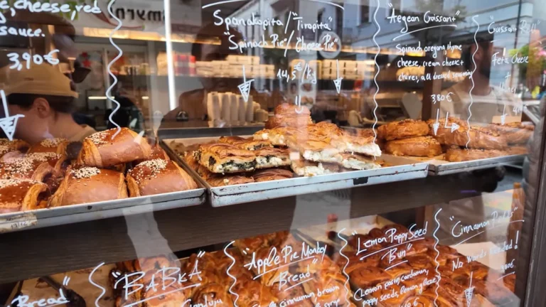 Croissants and sweet pastries in the 72H Artisanal Bakery window, Athens