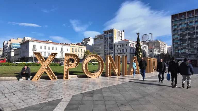 Omonia Square with giant festive letters and surrounding hotels and buildings