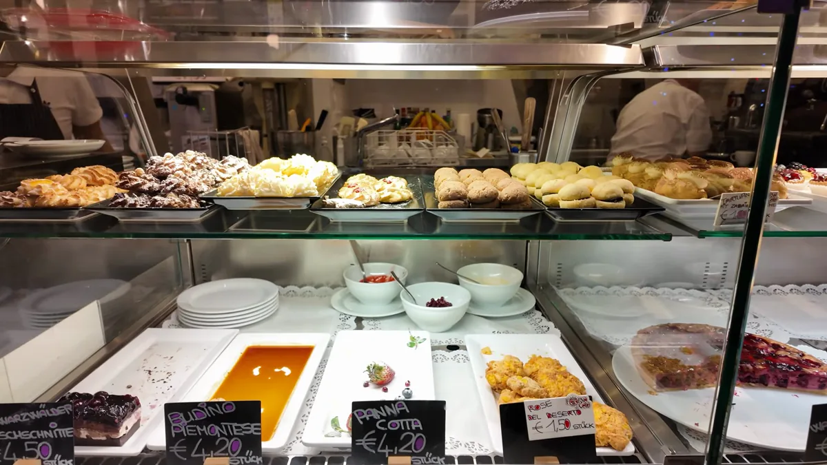 Pastry and dessert counter inside Freiburg Markthalle food hall