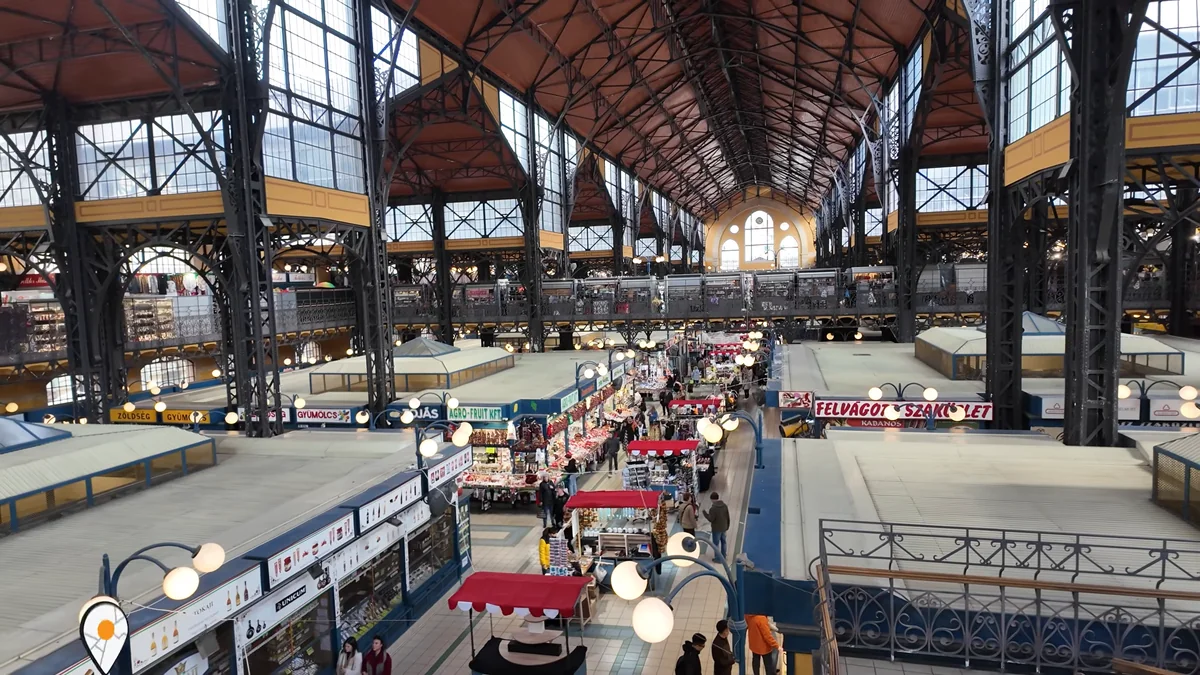 The main hall of the Great Market Hall in Budapest under its iron and glass roof