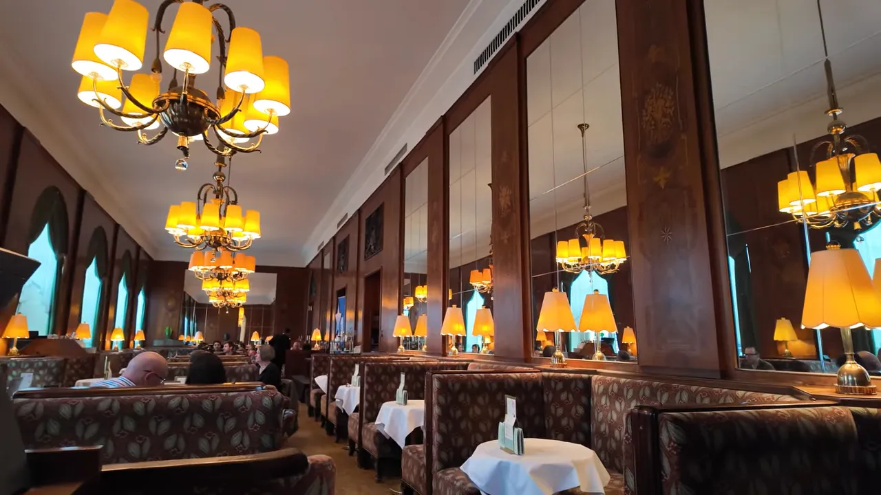 Velvet booths and white tablecloths at Café Landtmann